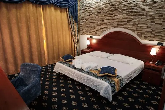 Deluxe Tek Büyük veya İki Ayrı Yataklı Oda
