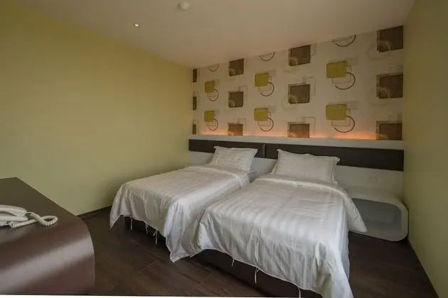 Deluxe Tek Büyük veya İki Ayrı Yataklı Oda