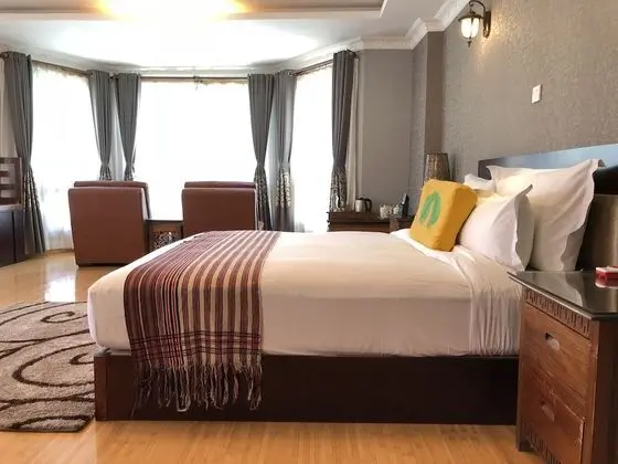 Deluxe Tek Büyük veya İki Ayrı Yataklı Oda