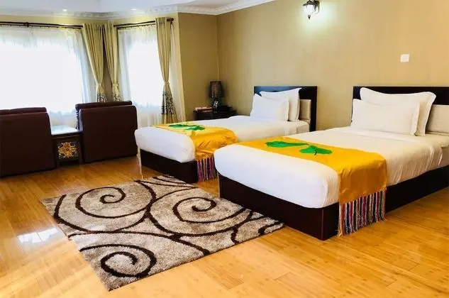 Deluxe Tek Büyük veya İki Ayrı Yataklı Oda