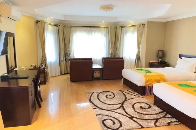 Deluxe Tek Büyük veya İki Ayrı Yataklı Oda