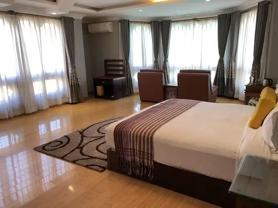 Deluxe Tek Büyük veya İki Ayrı Yataklı Oda