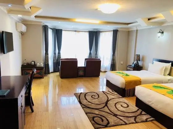 Deluxe Tek Büyük veya İki Ayrı Yataklı Oda