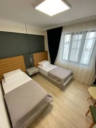 Suite İki Tek Yataklı Oda, Bahçe Manzaralı