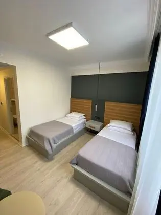 Suite İki Tek Yataklı Oda, Bahçe Manzaralı