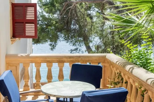 Tek Büyük Yataklı Oda, Kısmi Deniz Manzaralı (1 Adult + 1 Child)