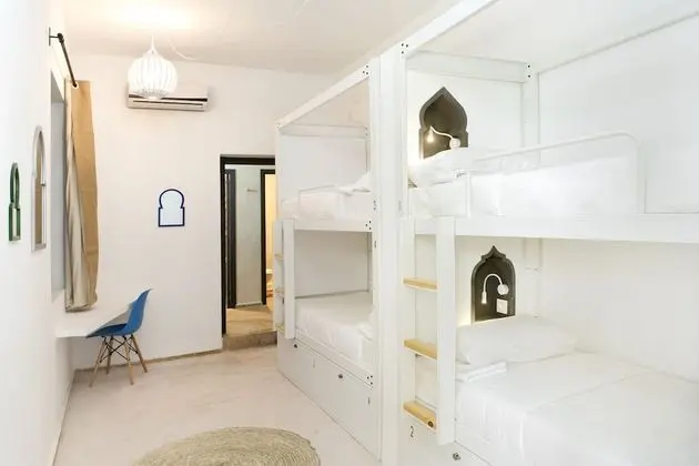 Bed in shared 4 female dorm with private bathroom