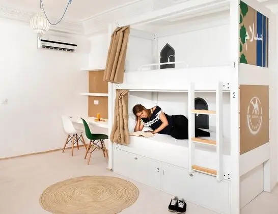 Bed in shared 4 female dorm with private bathroom