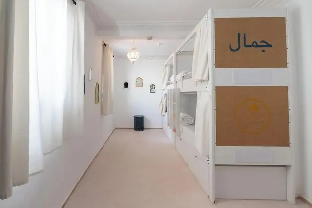 Bed in shared 4 female dorm with private bathroom