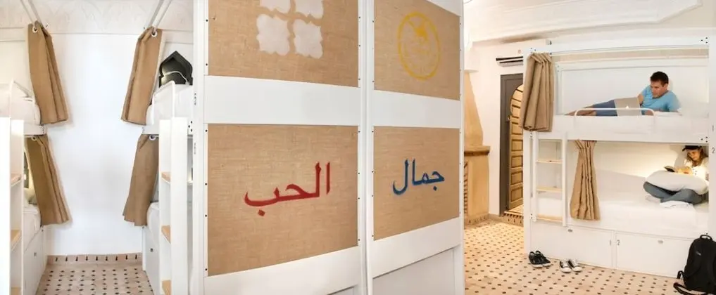 Bed in shared dorm of 8 mixed with private bathroom