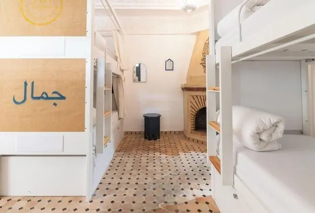 Bed in shared dorm of 8 mixed with private bathroom