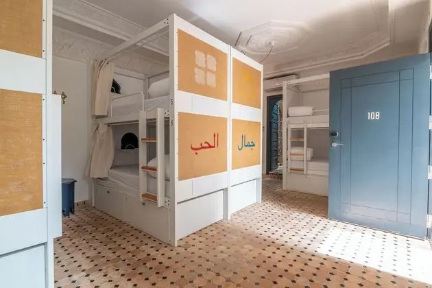 Bed in shared dorm of 8 mixed with private bathroom