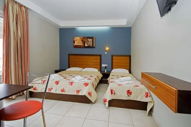 Üç Kişilik Oda