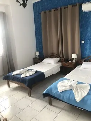 Basic Tek Büyük veya İki Ayrı Yataklı Oda
