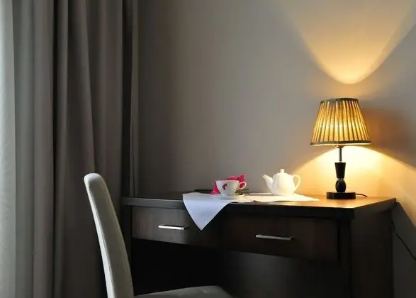 Deluxe Tek Büyük veya İki Ayrı Yataklı Oda