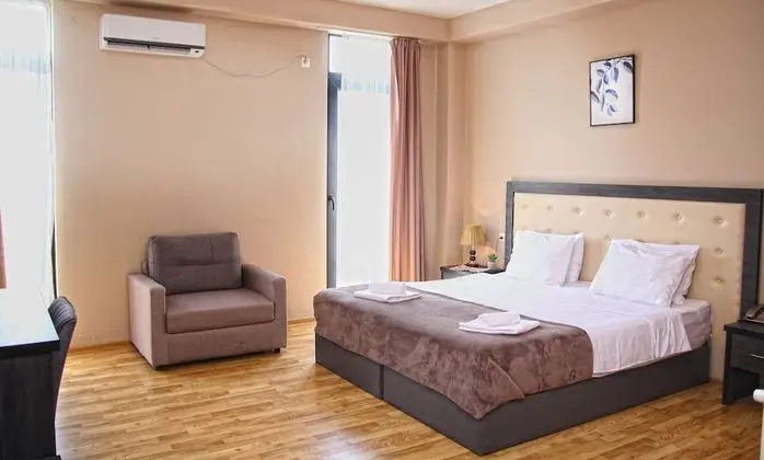 Deluxe Tek Büyük veya İki Ayrı Yataklı Oda