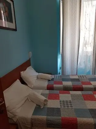 Tek Büyük veya İki Ayrı Yataklı Oda, Ortak Banyo