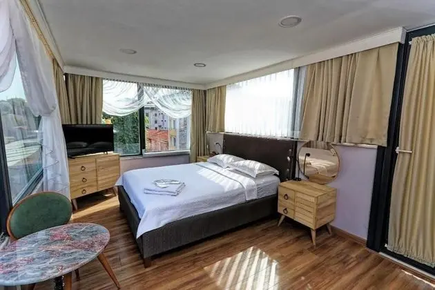Deluxe Tek Büyük Yataklı Oda