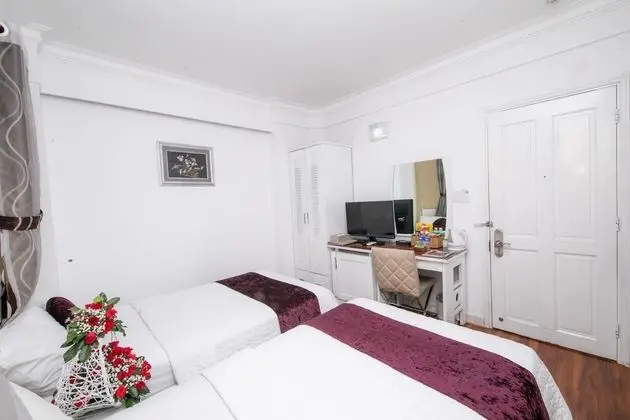 Deluxe Tek Büyük veya İki Ayrı Yataklı Oda