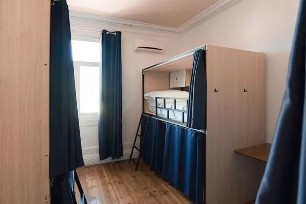 Bed in a 12-person mixed dormitory