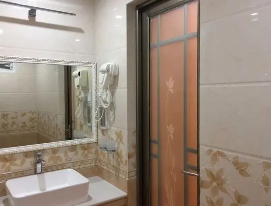 Deluxe Tek Büyük veya İki Ayrı Yataklı Oda
