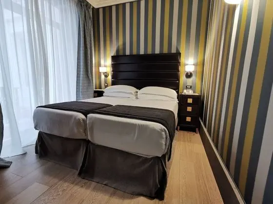 Deluxe Tek Büyük veya İki Ayrı Yataklı Oda