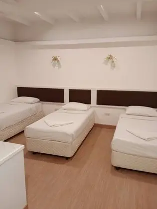 Üç Kişilik Oda