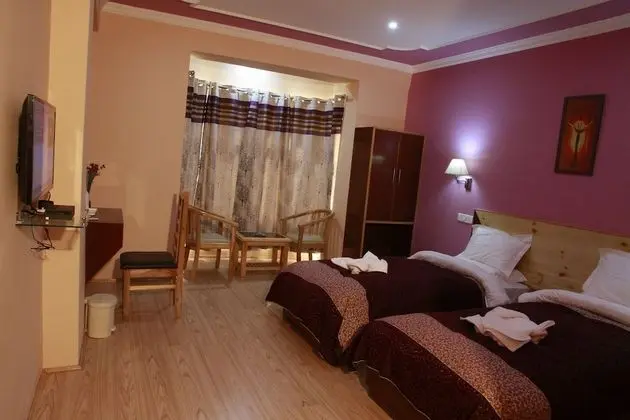 Deluxe Tek Büyük veya İki Ayrı Yataklı Oda