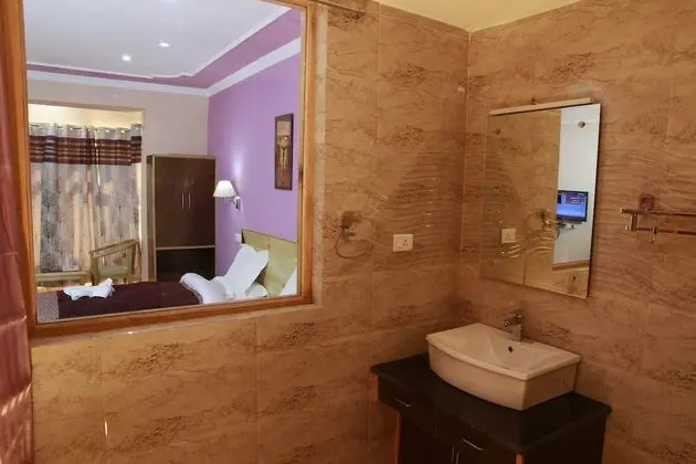 Deluxe Tek Büyük veya İki Ayrı Yataklı Oda