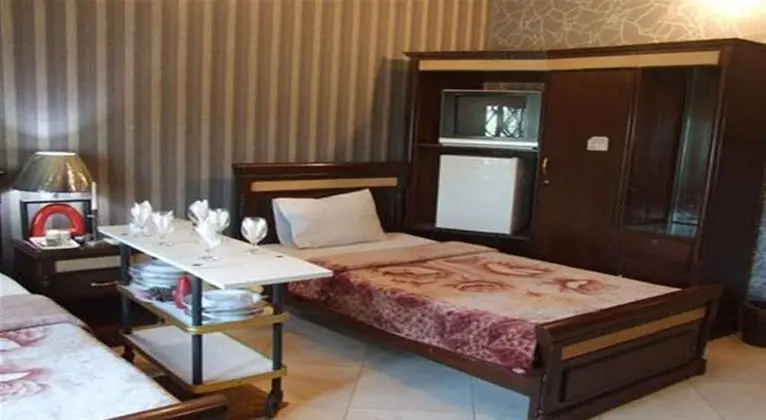 Deluxe Tek Büyük veya İki Ayrı Yataklı Oda