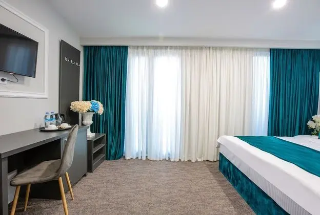 Deluxe Tek Büyük Yataklı Oda