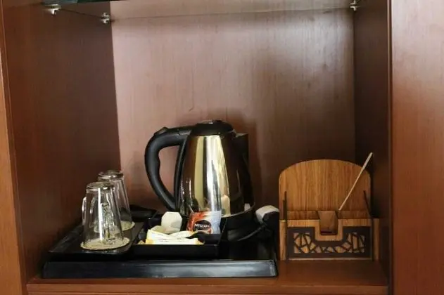 Tek Büyük veya İki Ayrı Yataklı Oda (Side Sea View and Garden View)