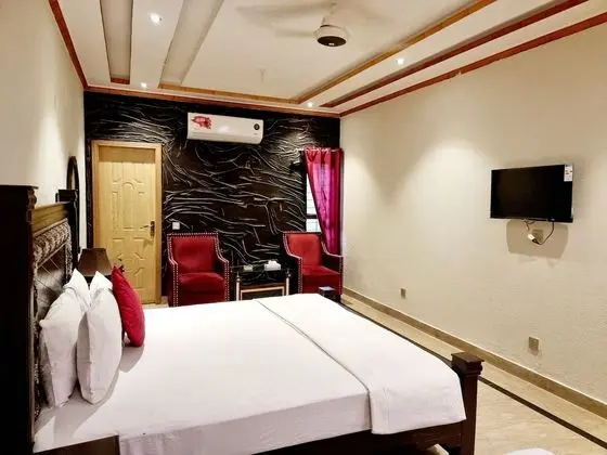 Deluxe Tek Büyük veya İki Ayrı Yataklı Oda