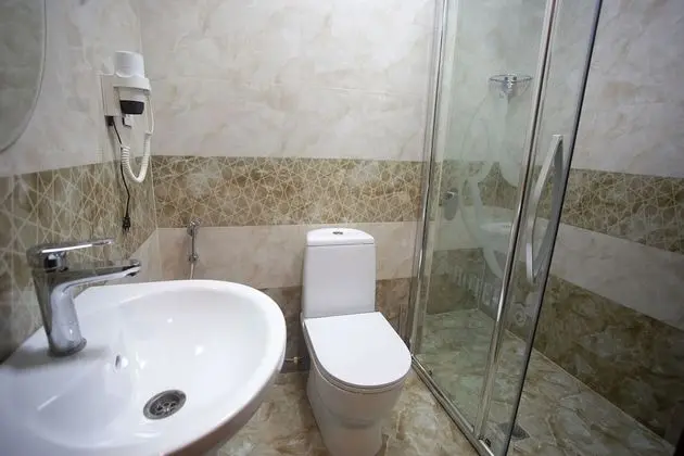 Economy Tek Büyük veya İki Ayrı Yataklı Oda