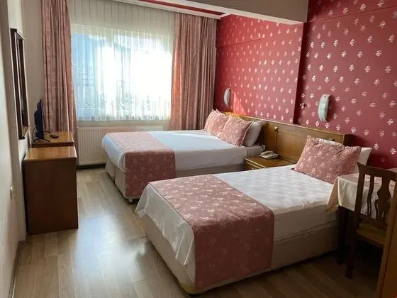 Üç Tek Yataklı Oda