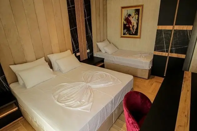Deluxe Üç Kişilik Oda