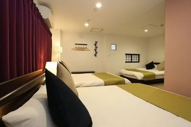 Deluxe Üç Kişilik Oda (3 Double Beds)