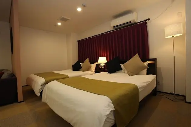 Deluxe Üç Kişilik Oda (3 Double Beds)