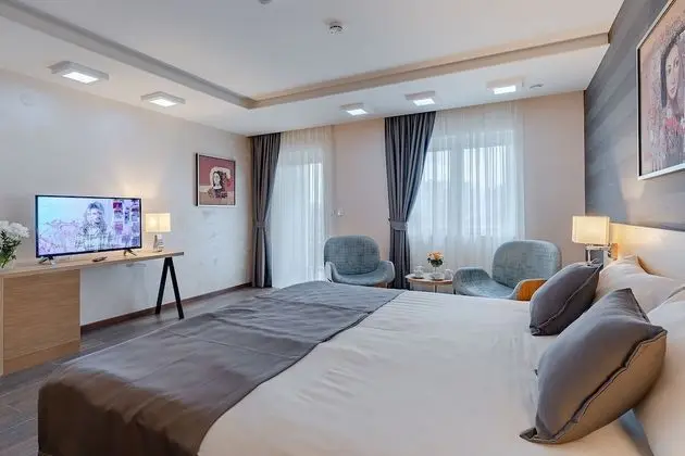 Deluxe Tek Büyük veya İki Ayrı Yataklı Oda