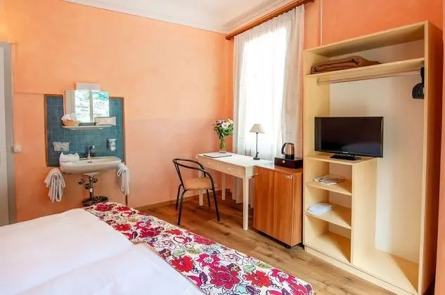 Economy Tek Büyük veya İki Ayrı Yataklı Oda