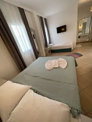 Üç Kişilik Oda