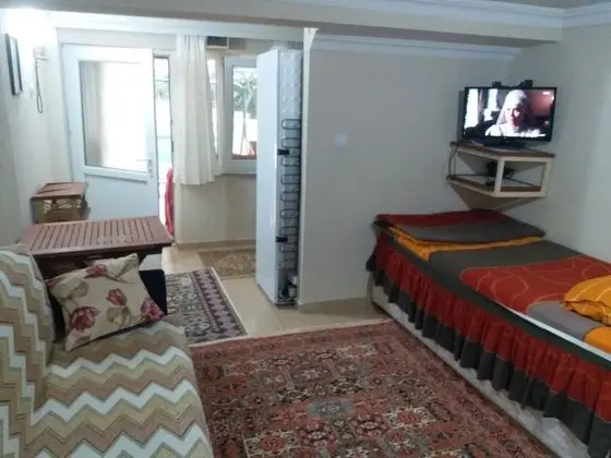 Standard Dört Kişilik Oda, Bahçe Manzaralı