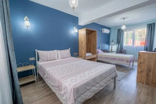 Üç Kişilik Oda, Bahçe Manzaralı, Balkonlu