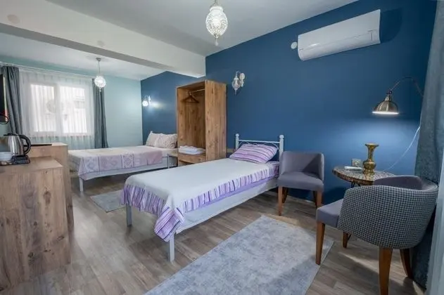Üç Kişilik Oda, Bahçe Manzaralı, Balkonlu