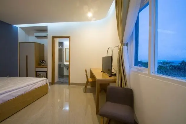 Deluxe Tek Büyük Yataklı Oda, Sigara İçilmez, Kısmi Deniz Manzarası