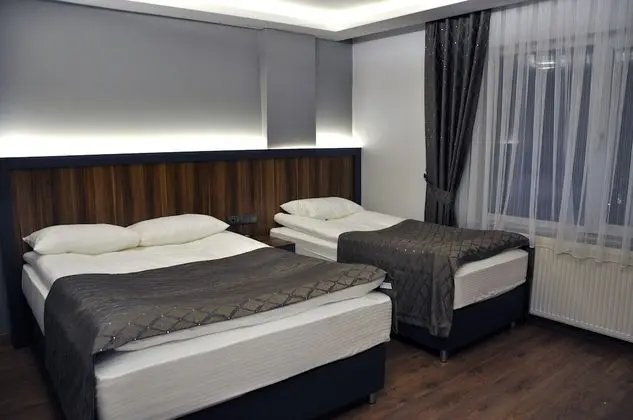 Basic Tek Büyük veya İki Ayrı Yataklı Oda