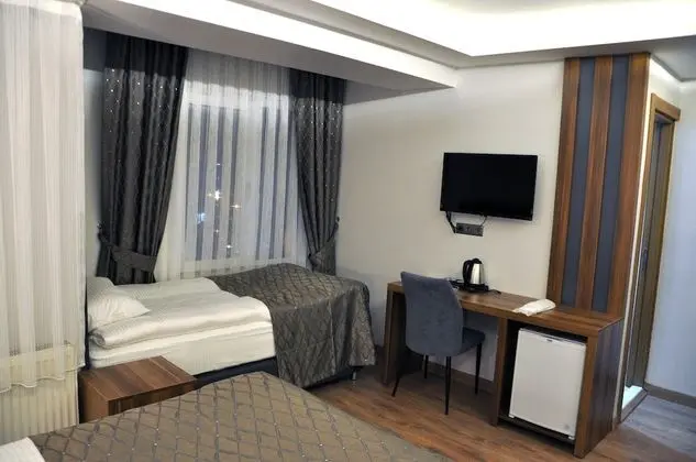 Basic Tek Büyük veya İki Ayrı Yataklı Oda