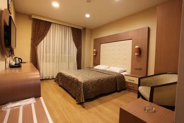 Deluxe Tek Büyük veya İki Ayrı Yataklı Oda