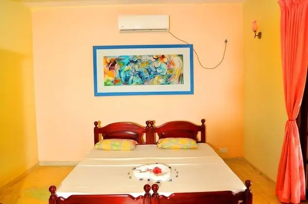 Deluxe Tek Büyük Yataklı Oda, Balkon, Bahçe Manzaralı