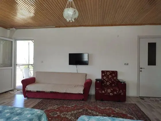 Balkonlu  dört  kişilik oda